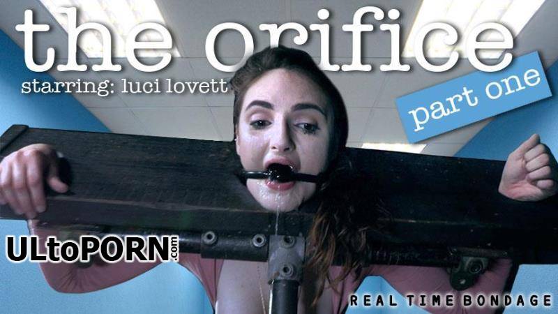RealTimeBondage.com: Luci Lovett - The Orifice Part 1 (December 15, 2018) [2.94 GB / HD / 720p] (Humiliation)